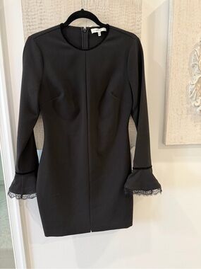 Likely Black Long-Sleeve Dress with Lace Trim Cuffs